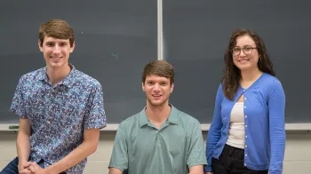 Andrew Roberts, Patrick Lachance and Hannah Skobe smile at the camera.