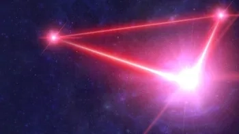 An illustration of the planned LISA mission showing lasers bouncing between three spacecraft.