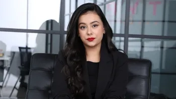 Image of a woman in an office.