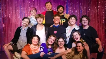 The cast and crew of The Trouble With Dead Boyfriends poses together. Annie Pulsipher stands in the top left, and Alex Petti stands in the top right.