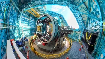 Wide view of the telescope mount inside the dome of the Rubin Observatory.